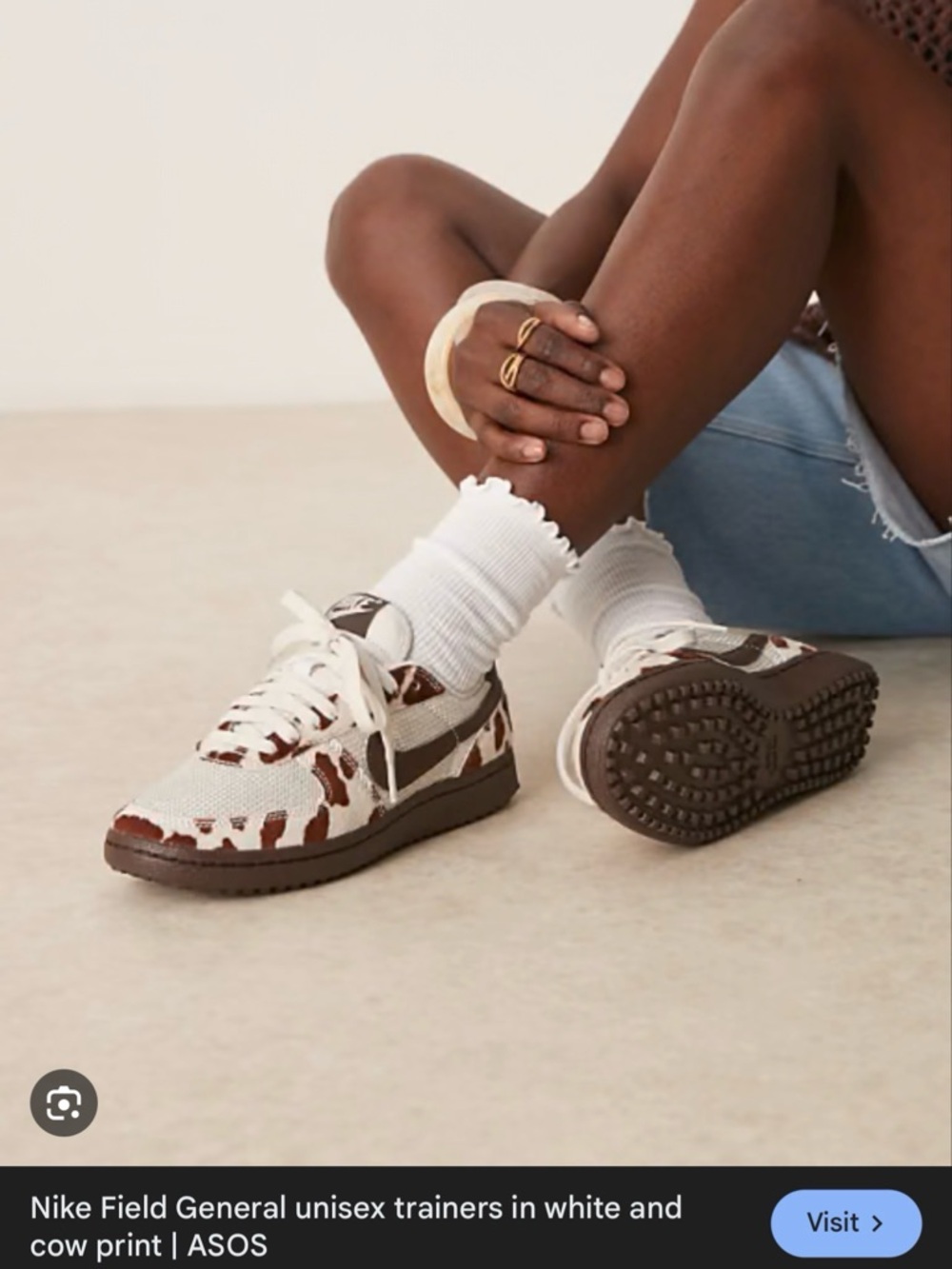 Nike Low-Top Sneakers in White and Brown Cow Print